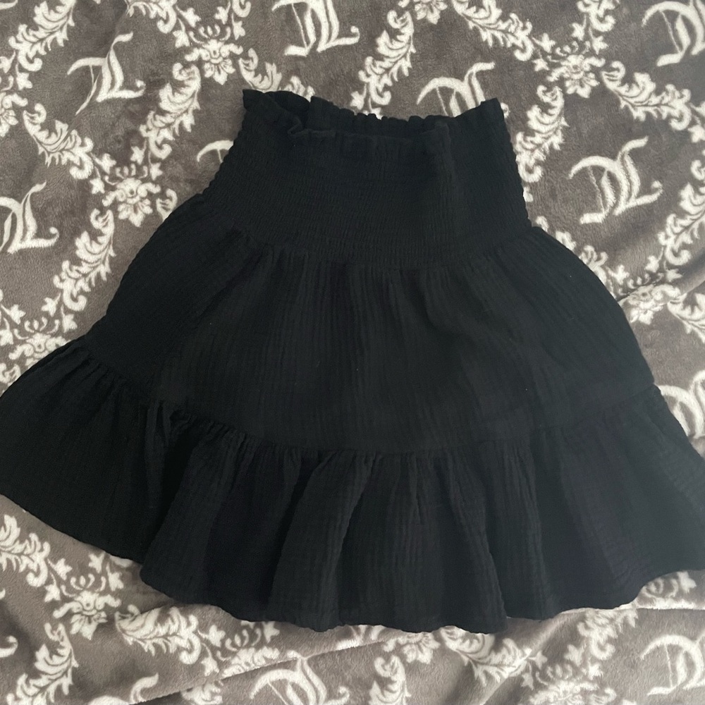 Black ruffle skirt